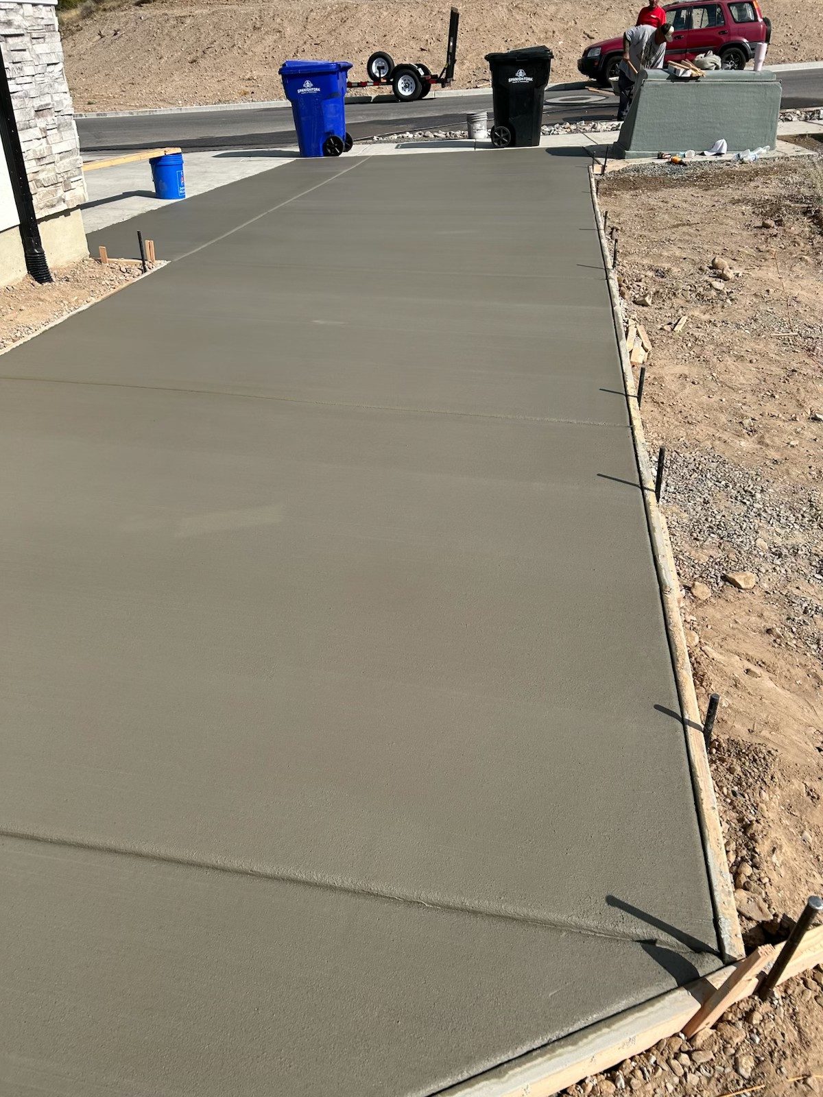 Driveway extension poured by Firm Foundation of Utah in Lehi, UT
